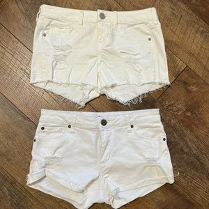 (2) pair distressed white denim jean shorts
